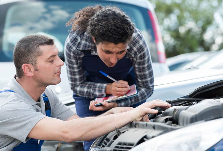 Car being serviced in garage